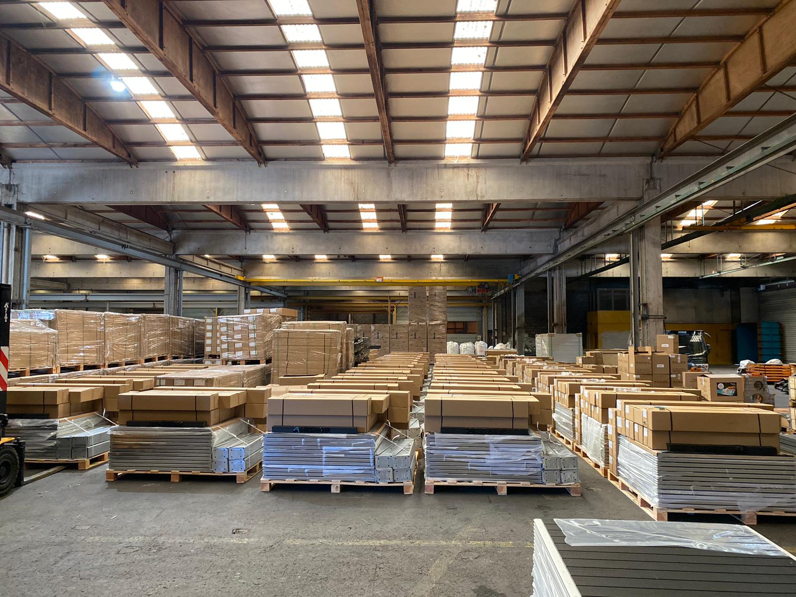 Warehouse with pallets of pool components